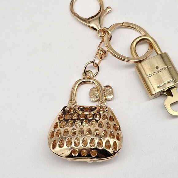 Authentic Louis Vuitton Lock & Key with unbranded Pearl Bag Keycharm, Keychain - Picture 6 of 8